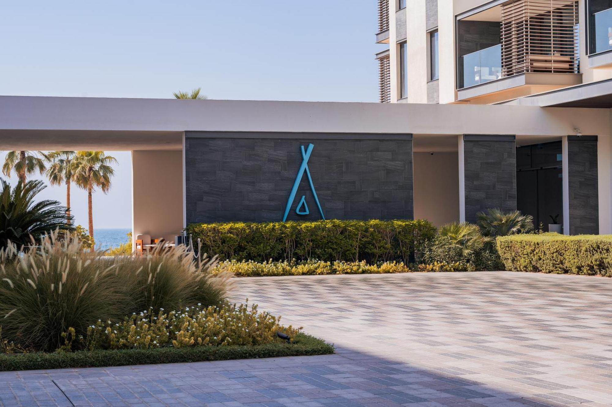 Nikki Beach Resort&Spa Dubai Bagian luar foto The Atlantis logo