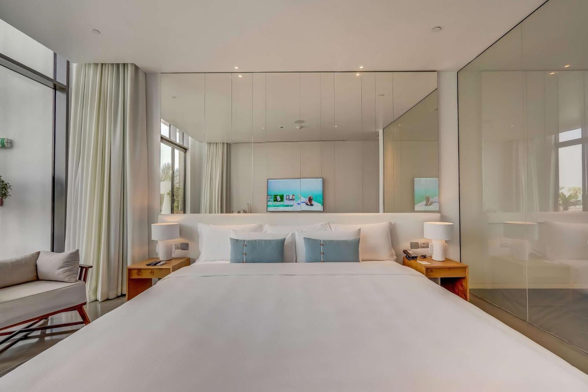Nikki Beach Resort&Spa Dubai Bagian luar foto A bedroom at the hotel