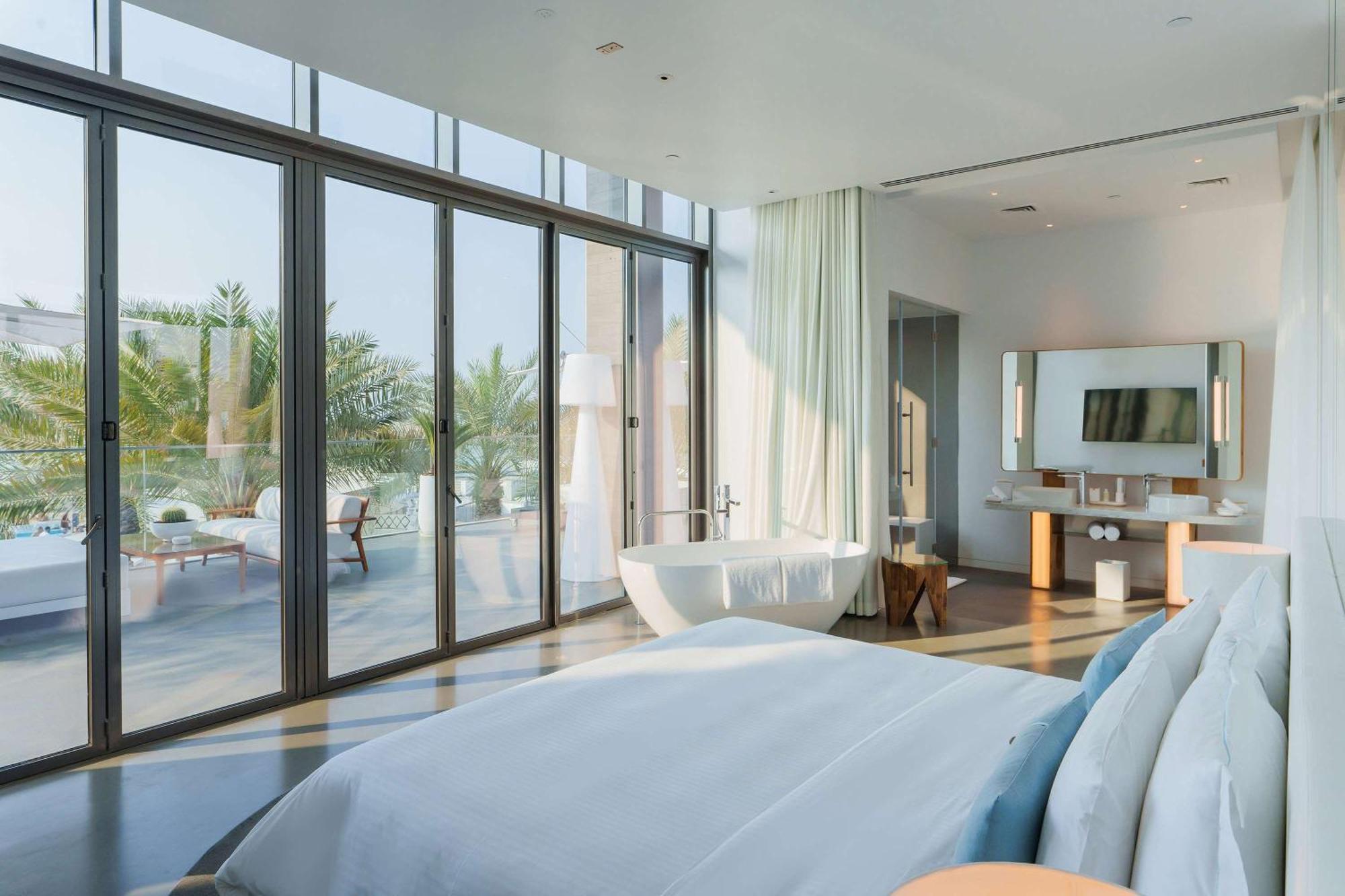 Nikki Beach Resort&Spa Dubai Bagian luar foto A bedroom at the Edition